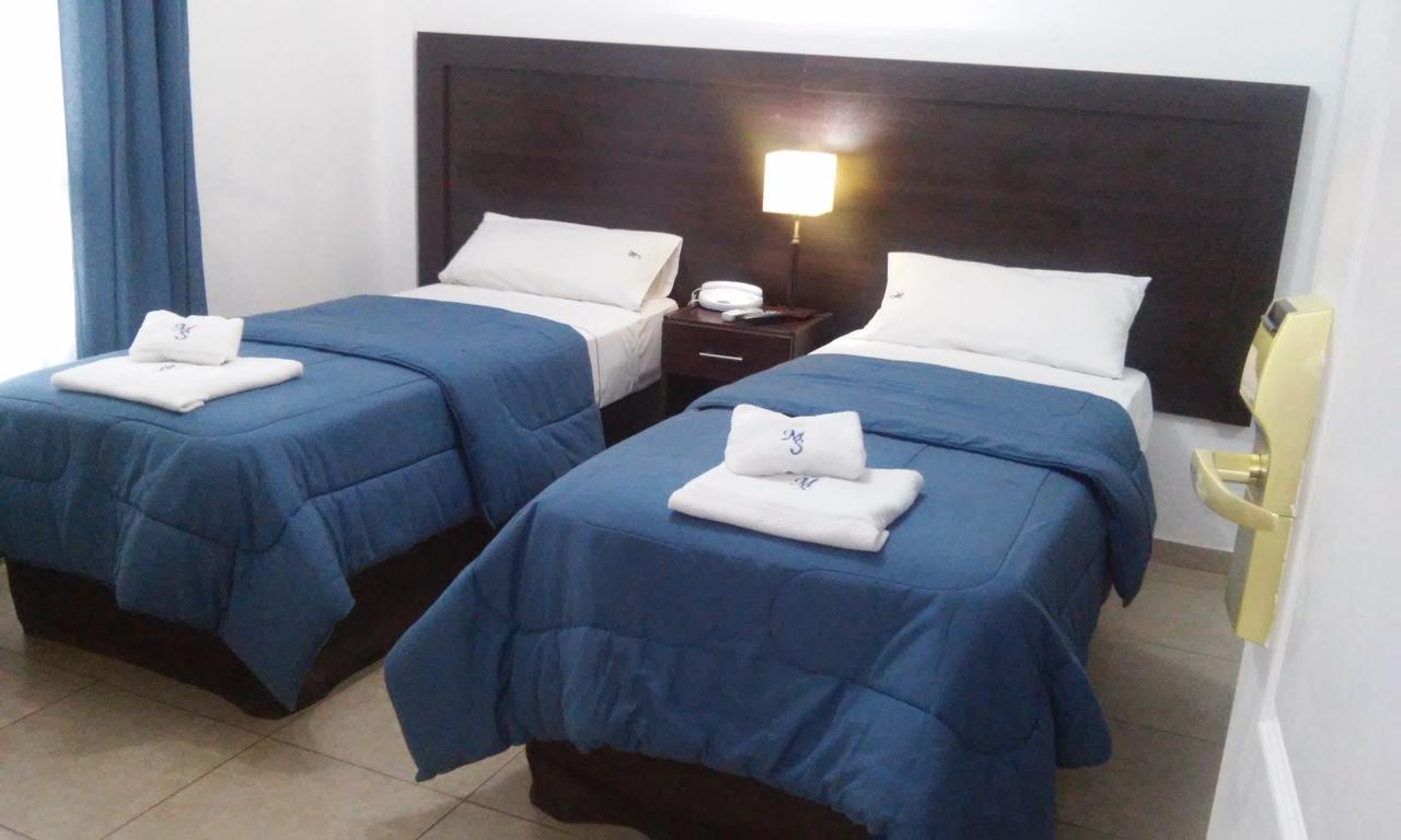 Morada Suites Campana Exteriör bild
